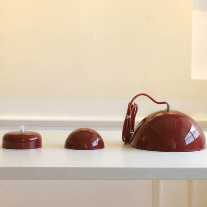 Halo pendant light two facing half sphere metal dome shape detail close up