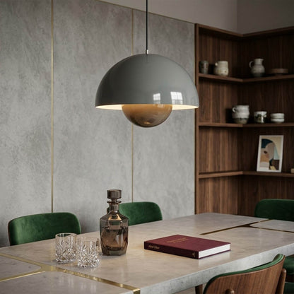 Halo pendant lights three in a row above kitchen island mid century modern interior