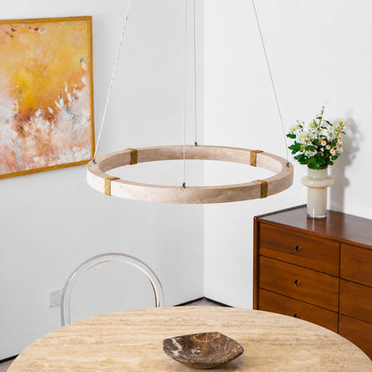 Halo travertine pendant light dining table single disc warm glow travertine stone Japandi American home lifestyle interior styled