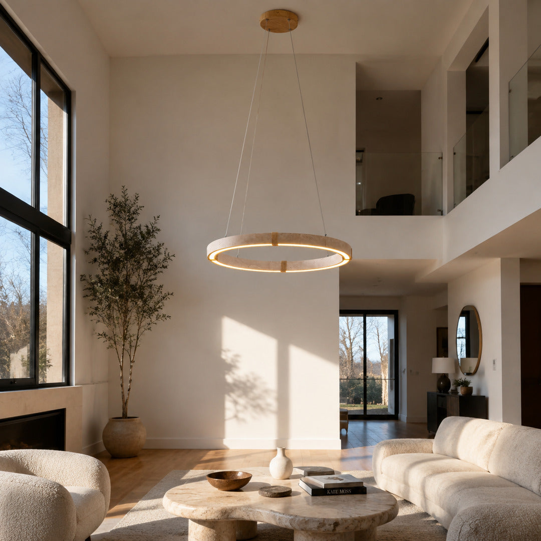 Halo travertine pendant light living room single disc warm glow travertine stone sculptural American home lifestyle interior styled