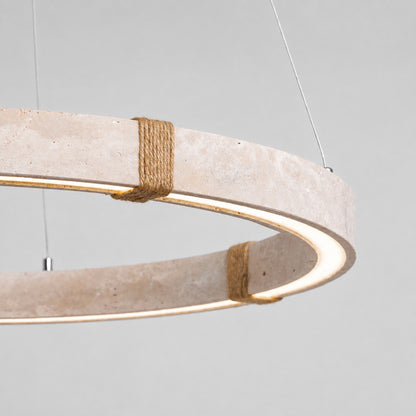 Halo travertine pendant light yellow travertine natural stone veining porous texture disc detail close up unique