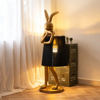 Vintage gold Hare silhouette table lamp highlighting a design-forward retail boutique display