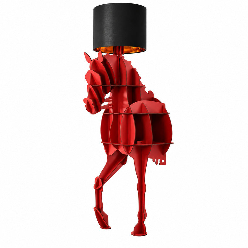 Horse floor lamp with a sculptural standing horse figure holding a fabric shade overhead glowing warm in a living room