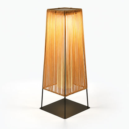 Close-up of the woven rattan-style texture on the Intreccio outdoor post light casting patterned light