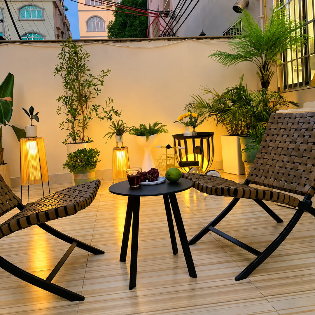 Tall Intreccio outdoor post light standing as a floor lantern on a backyard deck