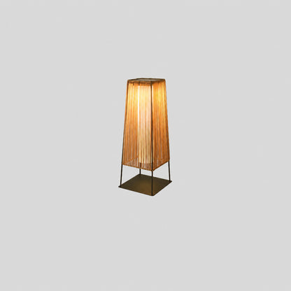 Medium 26.8-inch hardwired Intreccio outdoor post light beside a garden bench