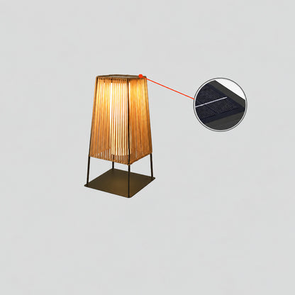Small 18.9-inch solar Intreccio outdoor post light on a sunny patio ledge