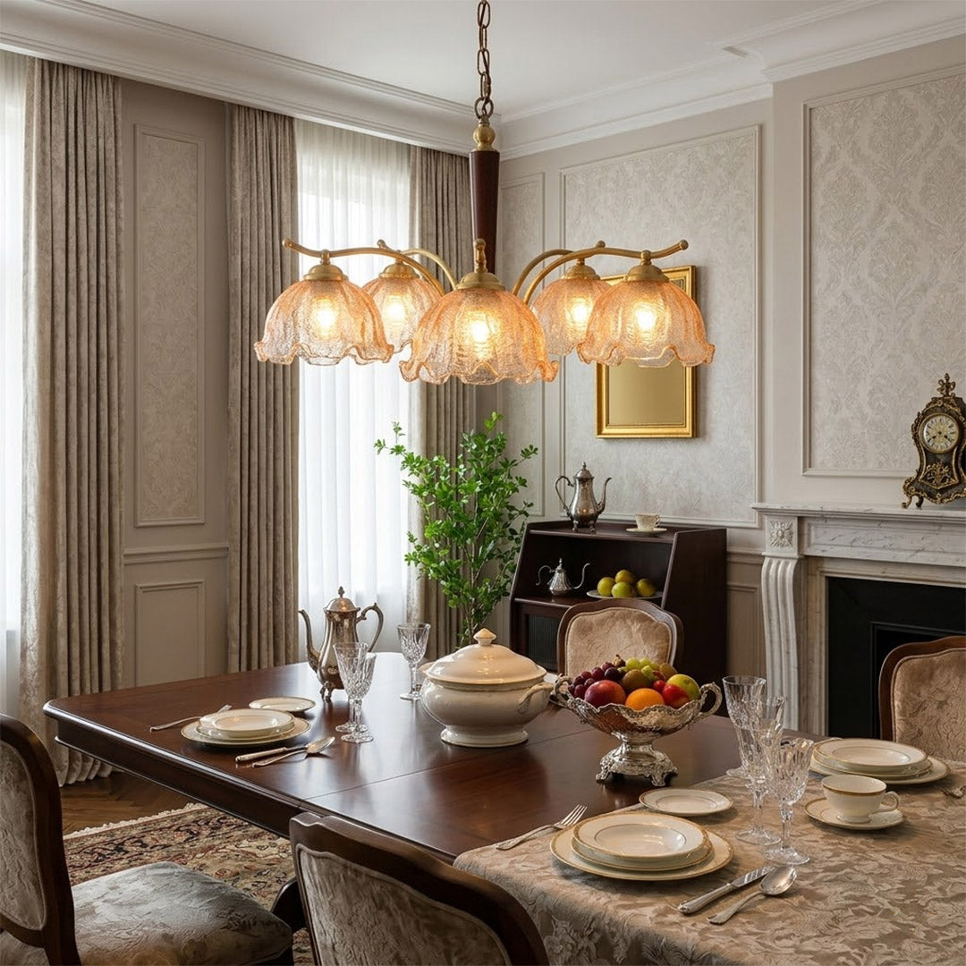 Iris 24 inch rippled glass wood chandelier above modern dining room rectangular table warm Edison glow transitional interior