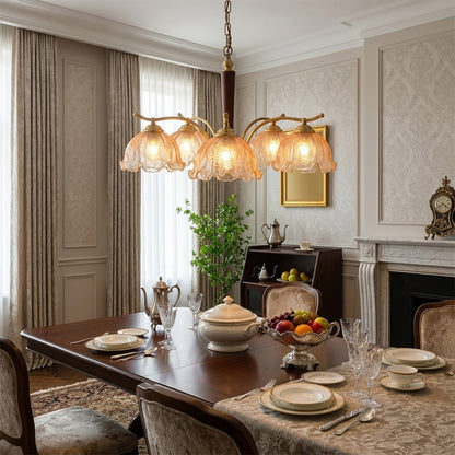 Iris 24 inch rippled glass wood chandelier above modern dining room rectangular table warm Edison glow transitional interior