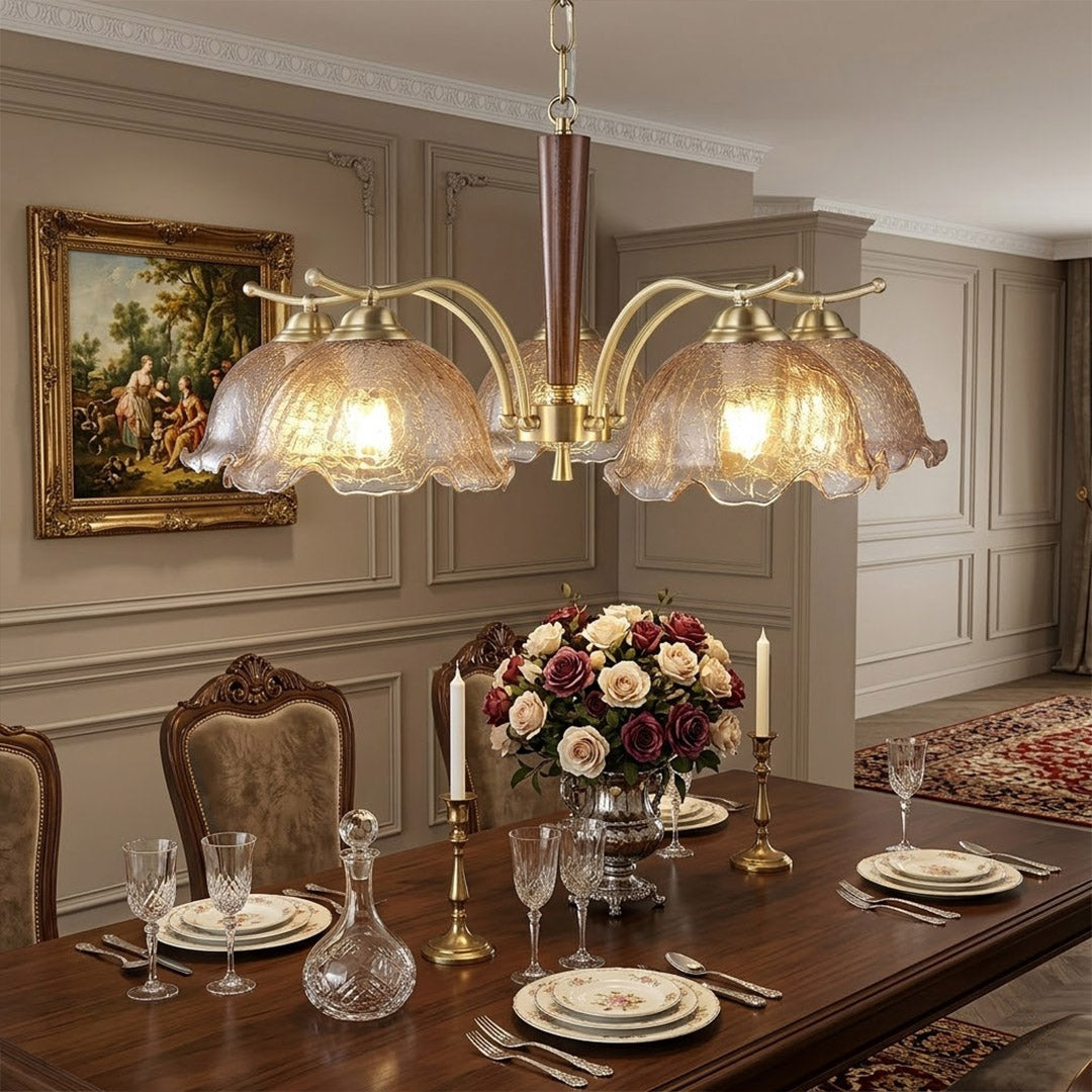 Iris 24 inch rippled glass wood chandelier above modern dining room rectangular table warm Edison glow transitional interior