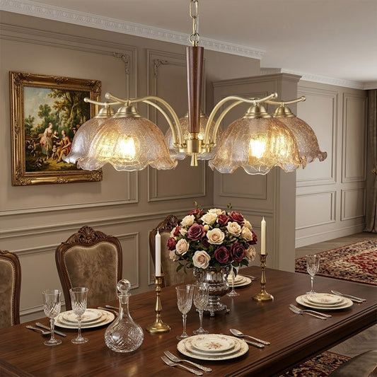 Iris 24 inch rippled glass wood chandelier above modern dining room rectangular table warm Edison glow transitional interior