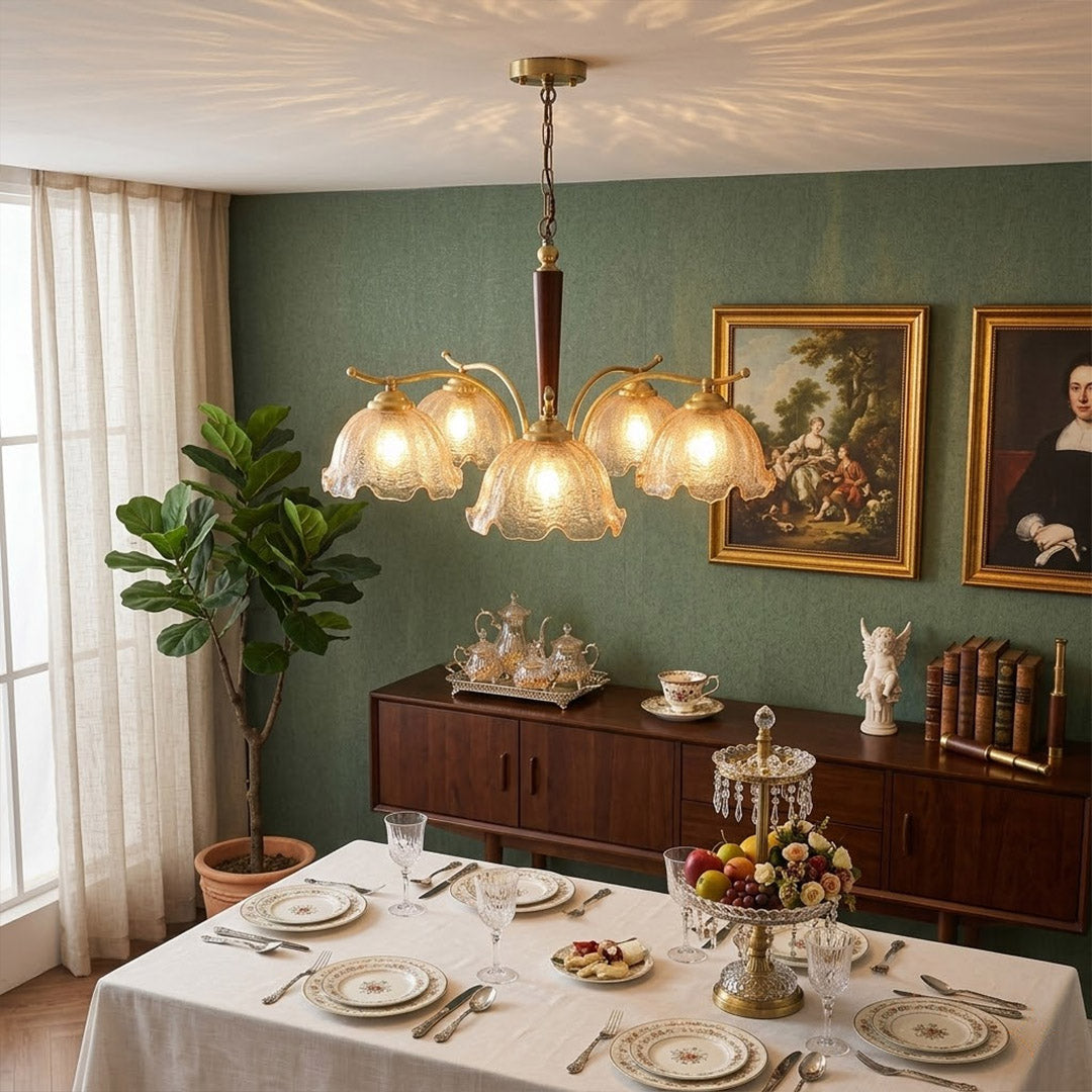 Iris 24 inch rippled glass wood chandelier above modern dining room rectangular table warm Edison glow transitional interior