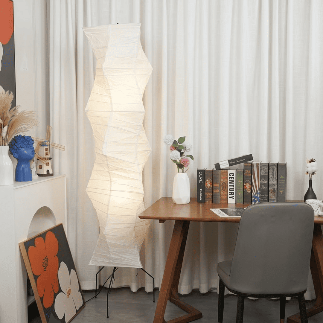 Washi paper floor lamp UF4-33N illuminating a minimalist living room.