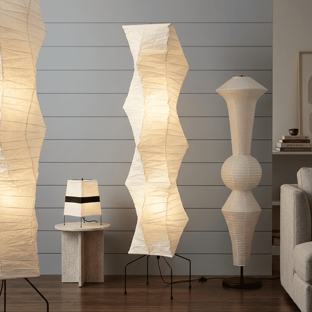 Washi paper floor lamp UF4-33N illuminating a minimalist living room.