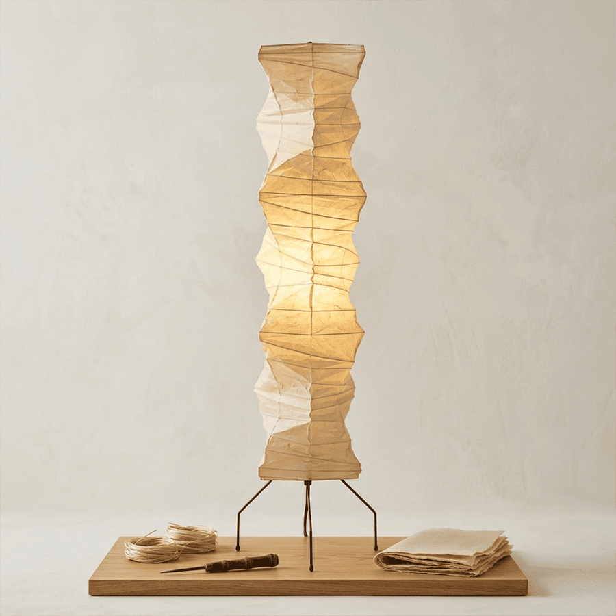 Washi paper floor lamp UF4-33N styling in a warm bedroom.