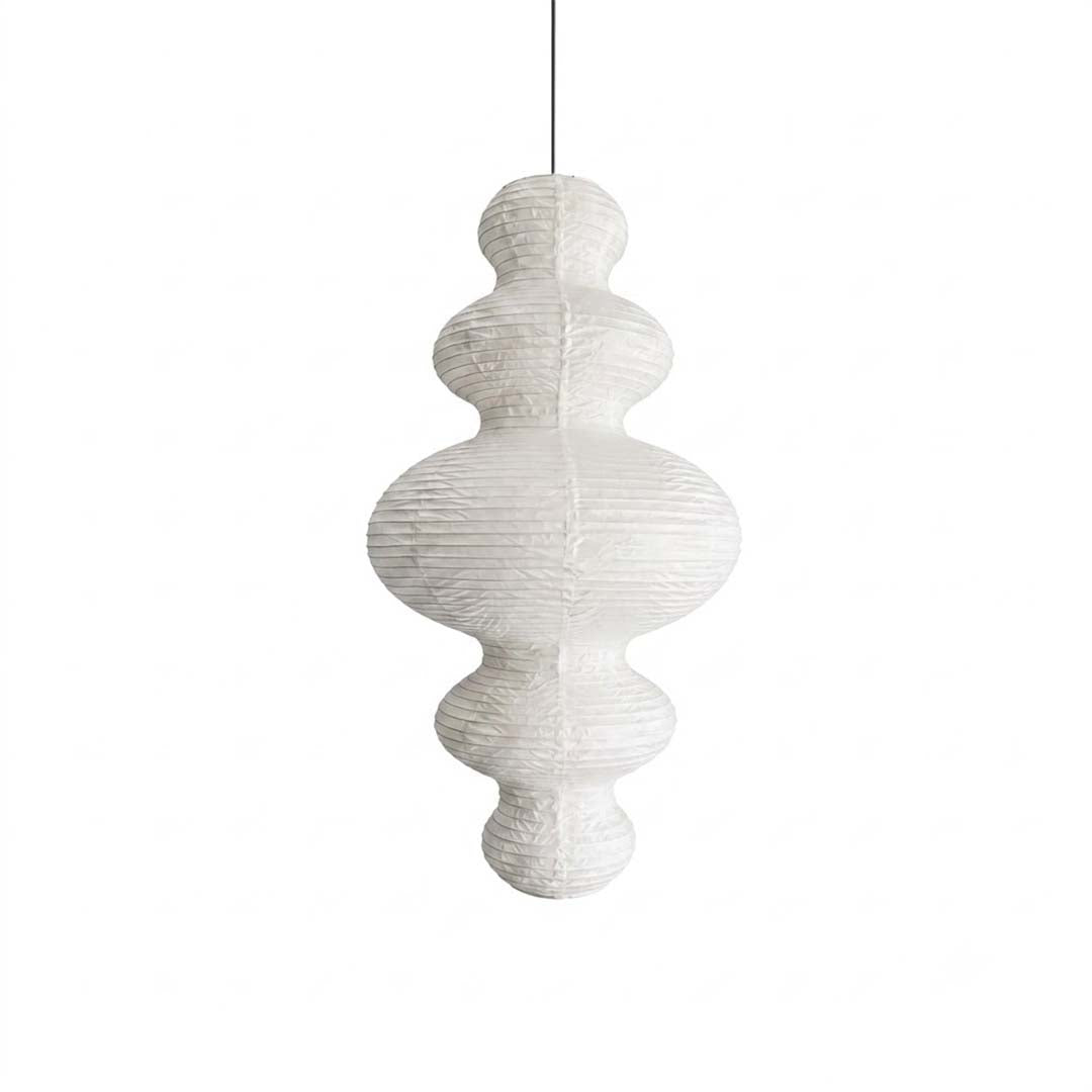 Stuber Lighting Japandi style rice paper pendant lamp with a multi-tiered ribbed lantern silhouette, perfect for Wabi-Sabi and minimalist organic modern interior designs.