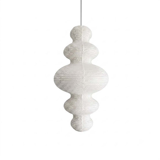 Stuber Lighting Japandi style rice paper pendant lamp with a multi-tiered ribbed lantern silhouette, perfect for Wabi-Sabi and minimalist organic modern interior designs.