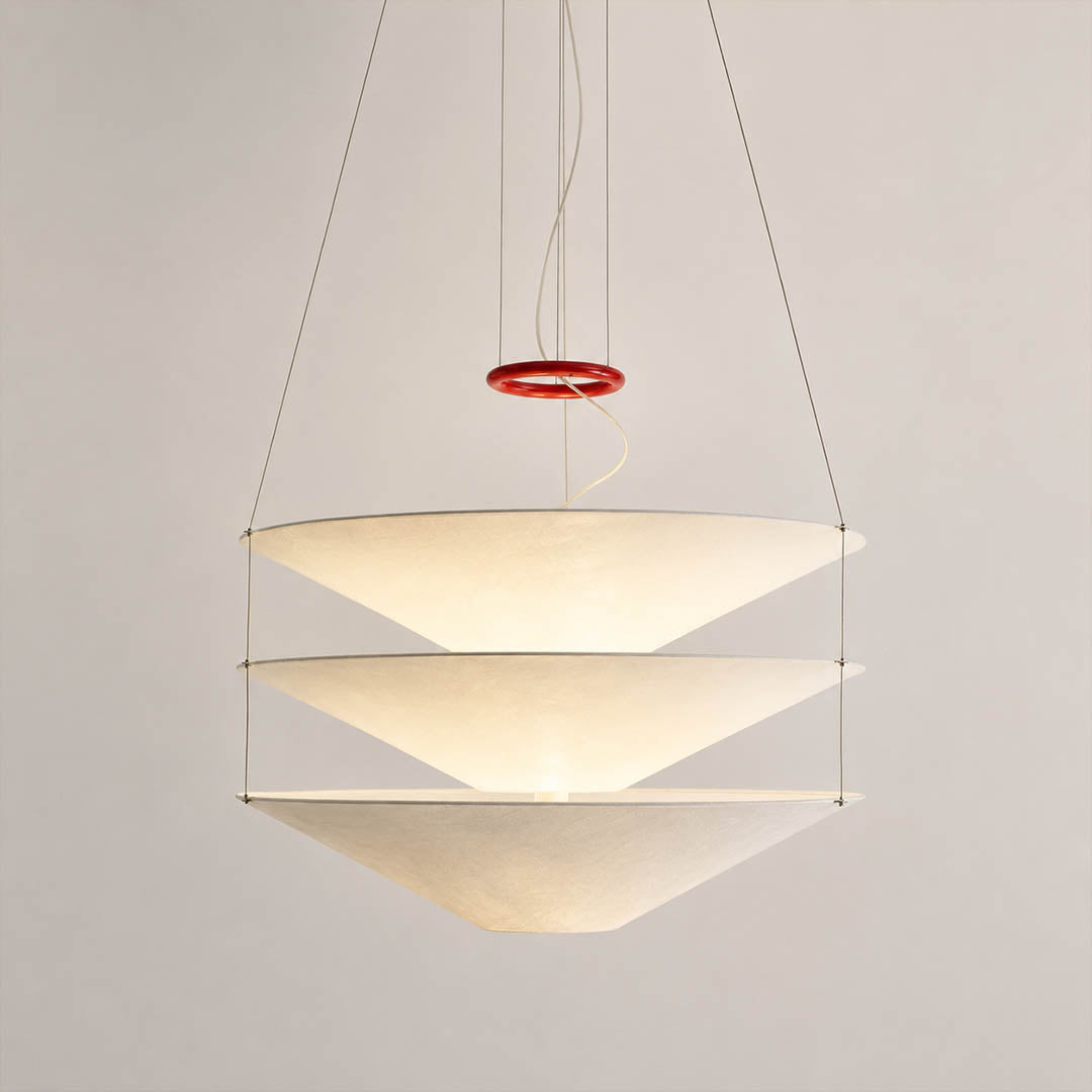 Kōun pendant light sleek thin suspension cables minimalist floating shade attachment hardware detail close up architectural