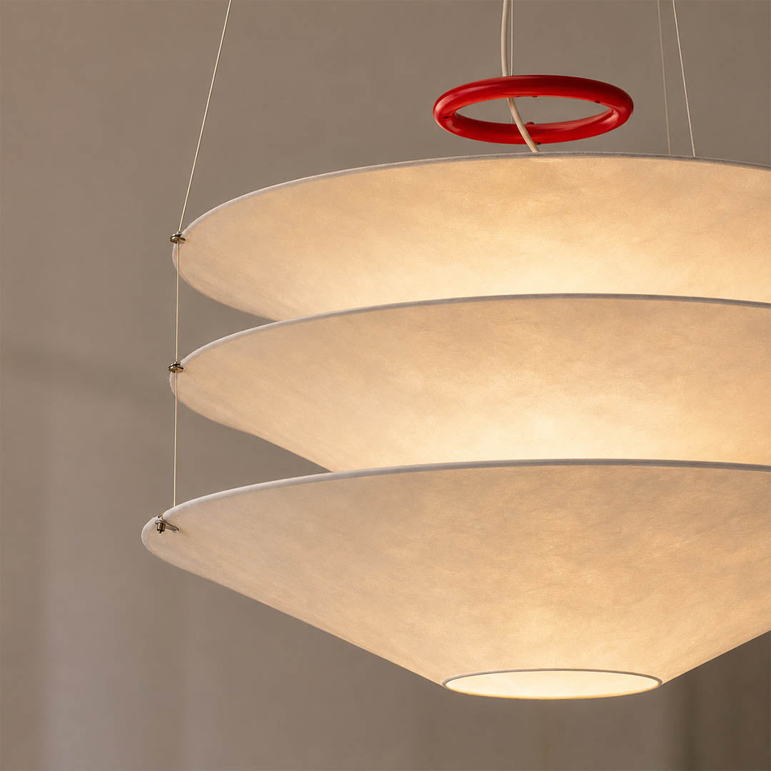 Kōun pendant light striking red iron ring top accent signature Art Deco bold color pop contrast detail close up architectural sophisticated