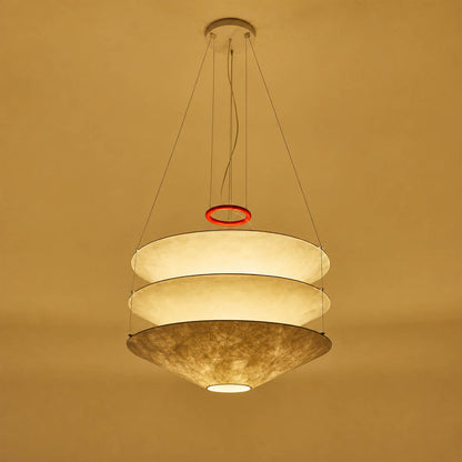 Kōun pendant light illuminated warm bulb evening glow ambient atmospheric soft light layered shades three tiers detail close up modern Art Deco