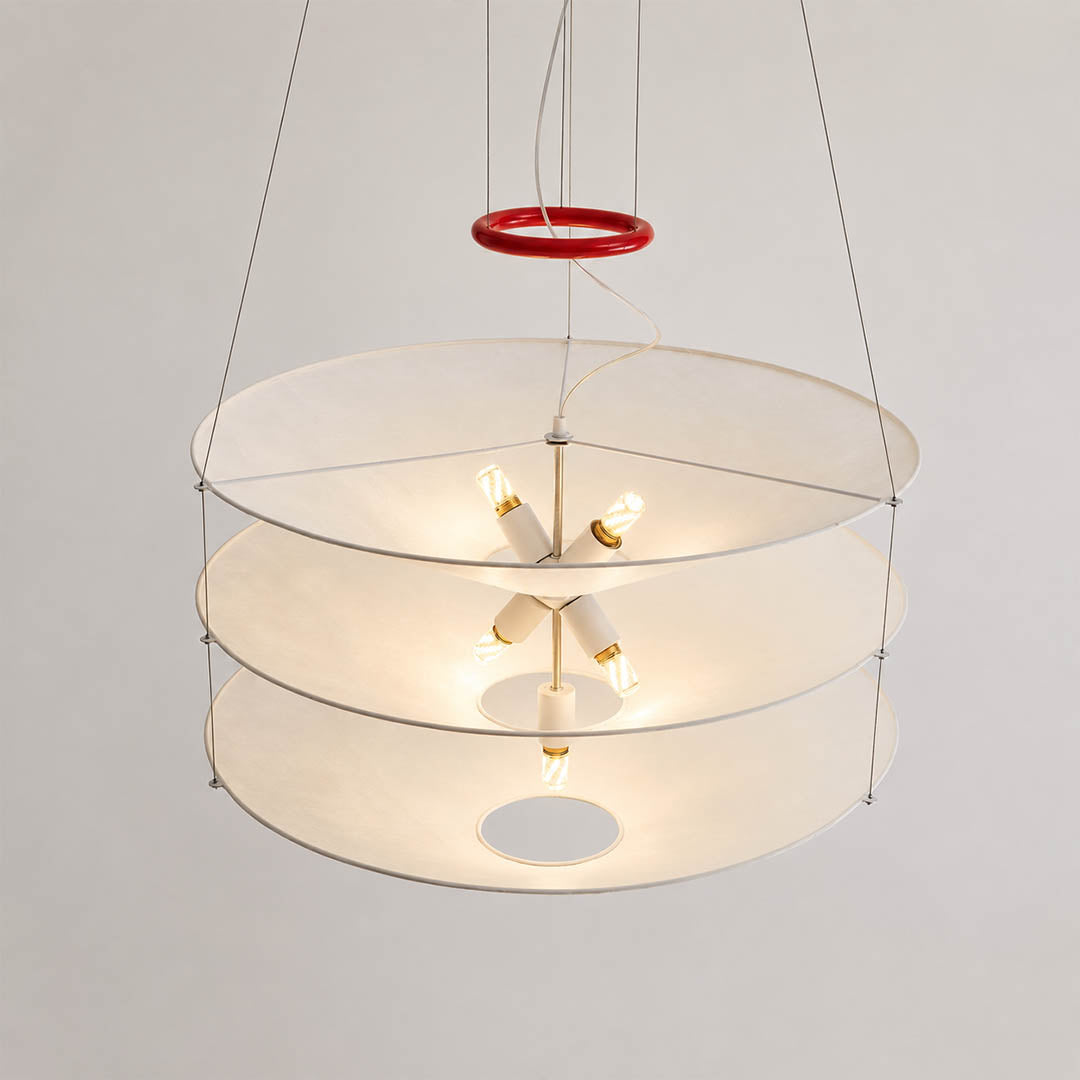 Kōun pendant light sleek thin suspension cables minimalist floating shade attachment hardware detail close up architectural
