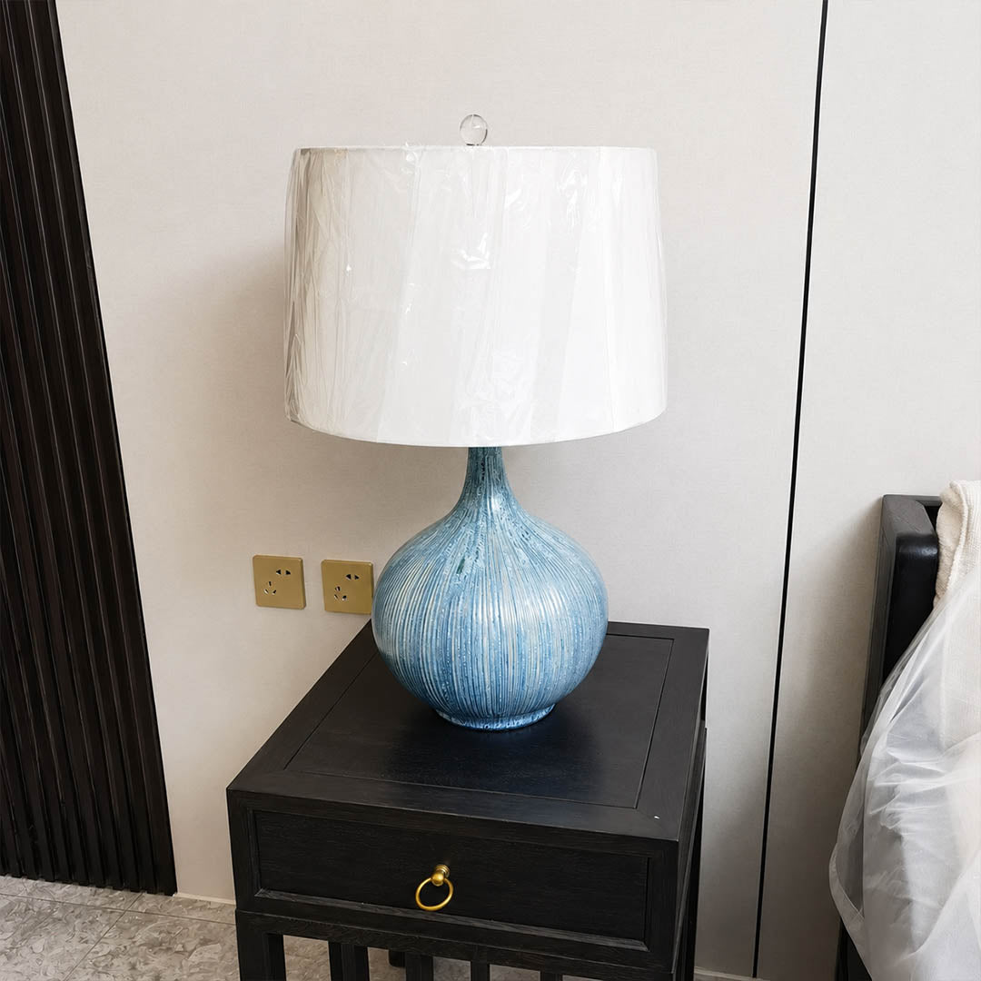 Kova ceramic table lamp bedroom nightstand bedside blue ceramic white shade warm glow cozy American home lifestyle interior styled