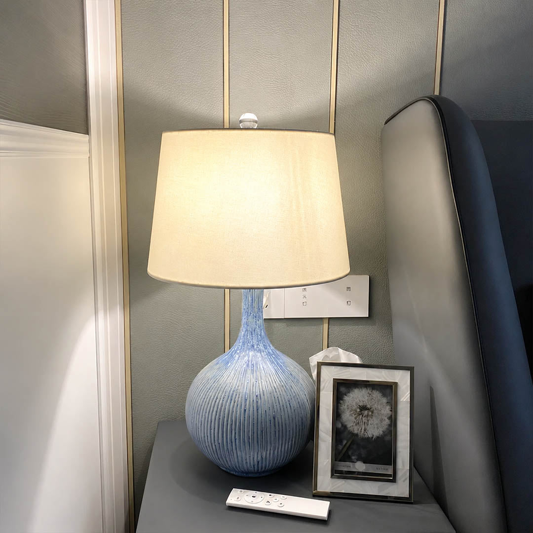 Kova ceramic table lamp bedroom nightstand bedside blue ceramic white shade warm glow cozy American home lifestyle interior styled