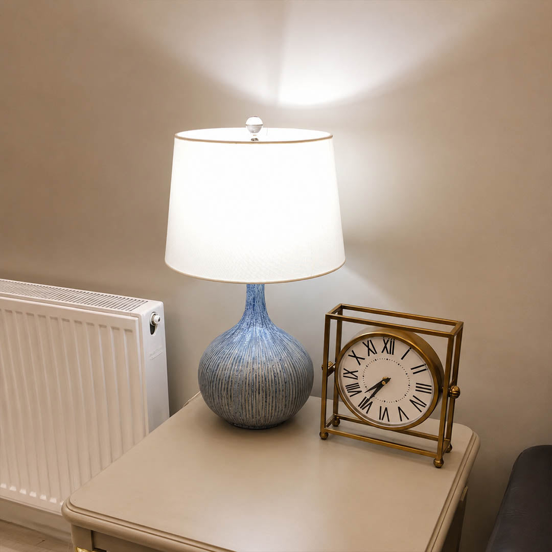 Kova ceramic table lamp bedroom nightstand bedside blue ceramic white shade warm glow cozy American home lifestyle interior styled