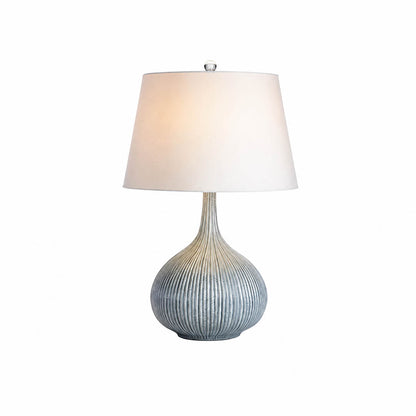 Kova ceramic table lamp large blue ceramic body white fabric shade sculptural statement white background front view