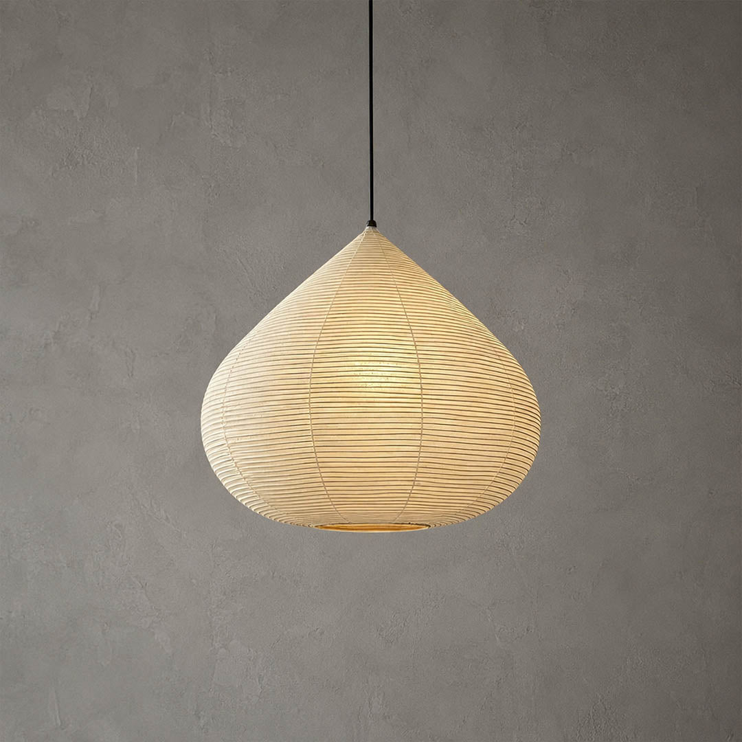 Kuri pendant light Japanese washi paper bamboo silk rounded chestnut form 23.6 inch handcrafted intimate warm glow dining table bedroom foyer statement white background