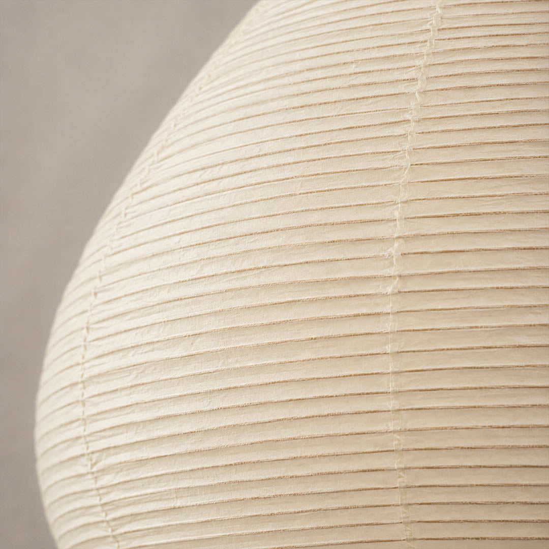 Kuri pendant light bamboo silk natural woven texture organic material quiet depth softness detail close up craftsmanship Japanese