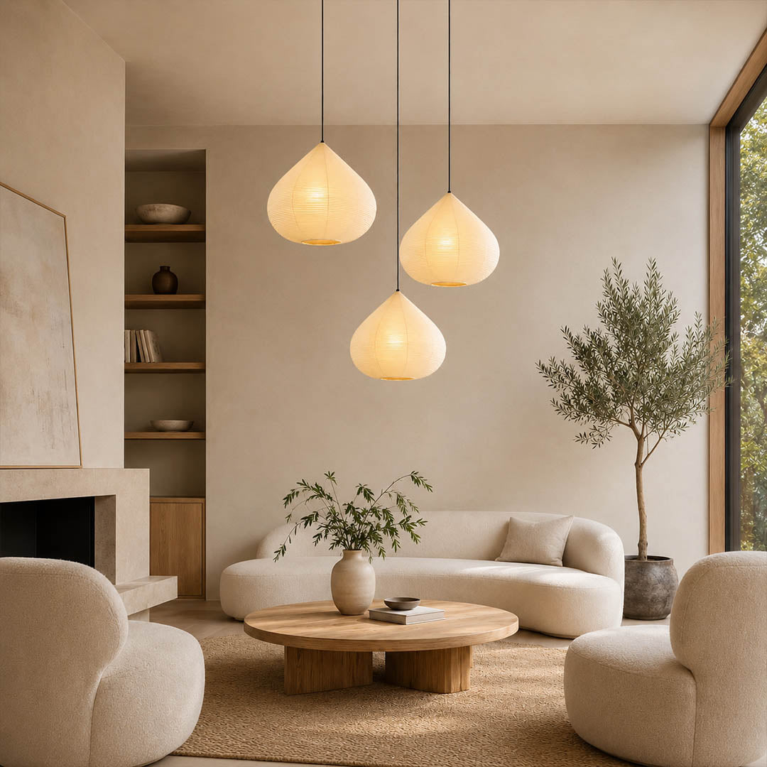 Kuri pendant light 17.7 inch reading corner armchair cozy intimate Japandi warm ambient sculptural chestnut Japanese lifestyle interior