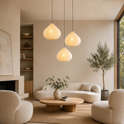 Kuri pendant light 17.7 inch reading corner armchair cozy intimate Japandi warm ambient sculptural chestnut Japanese lifestyle interior