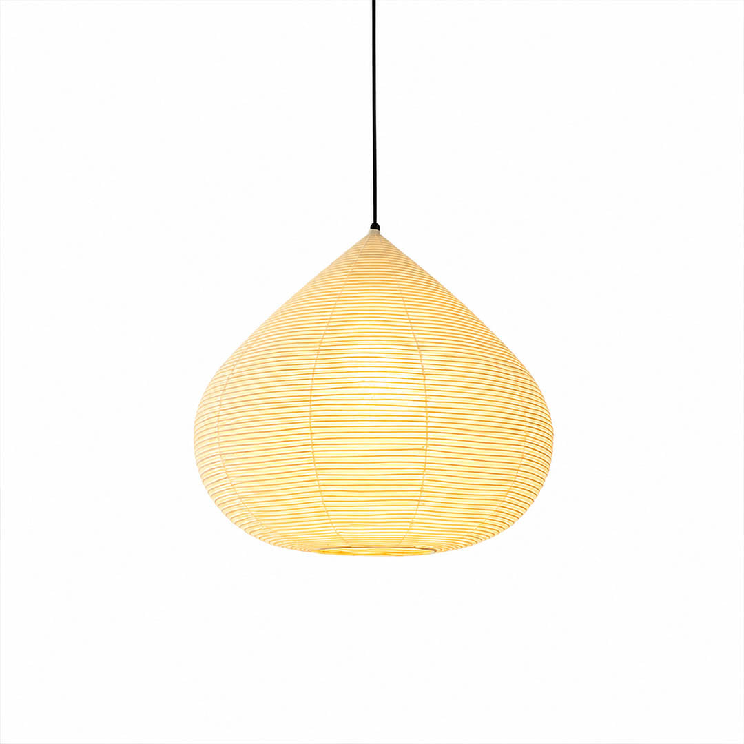 Kuri pendant light Japanese washi paper bamboo silk rounded chestnut form 23.6 inch handcrafted intimate warm glow dining table bedroom foyer statement white background