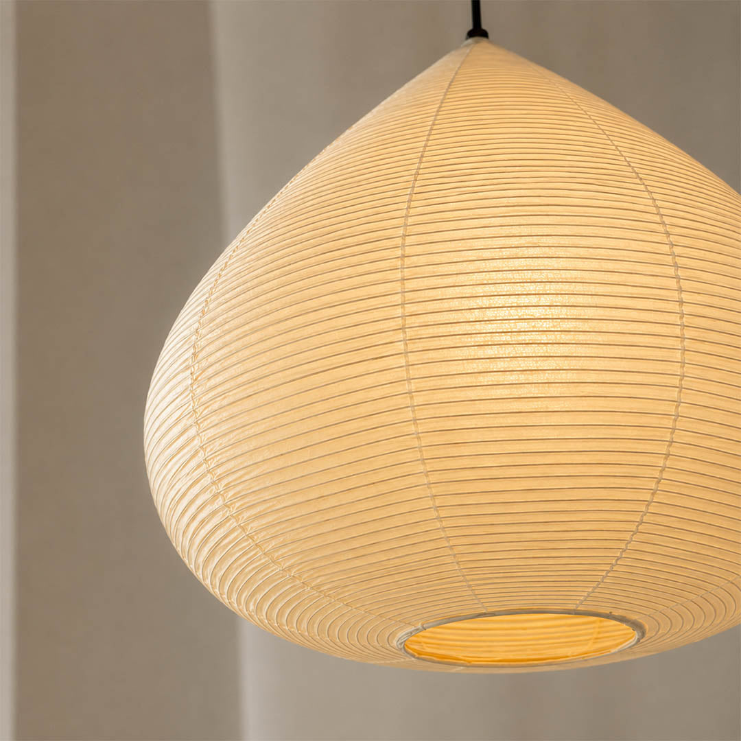 Kuri pendant light bamboo silk natural woven texture organic material quiet depth softness detail close up craftsmanship Japanese