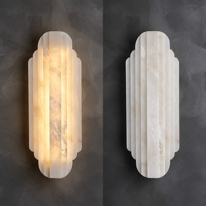Lamina alabaster wall sconce shown lit and unlit side by side