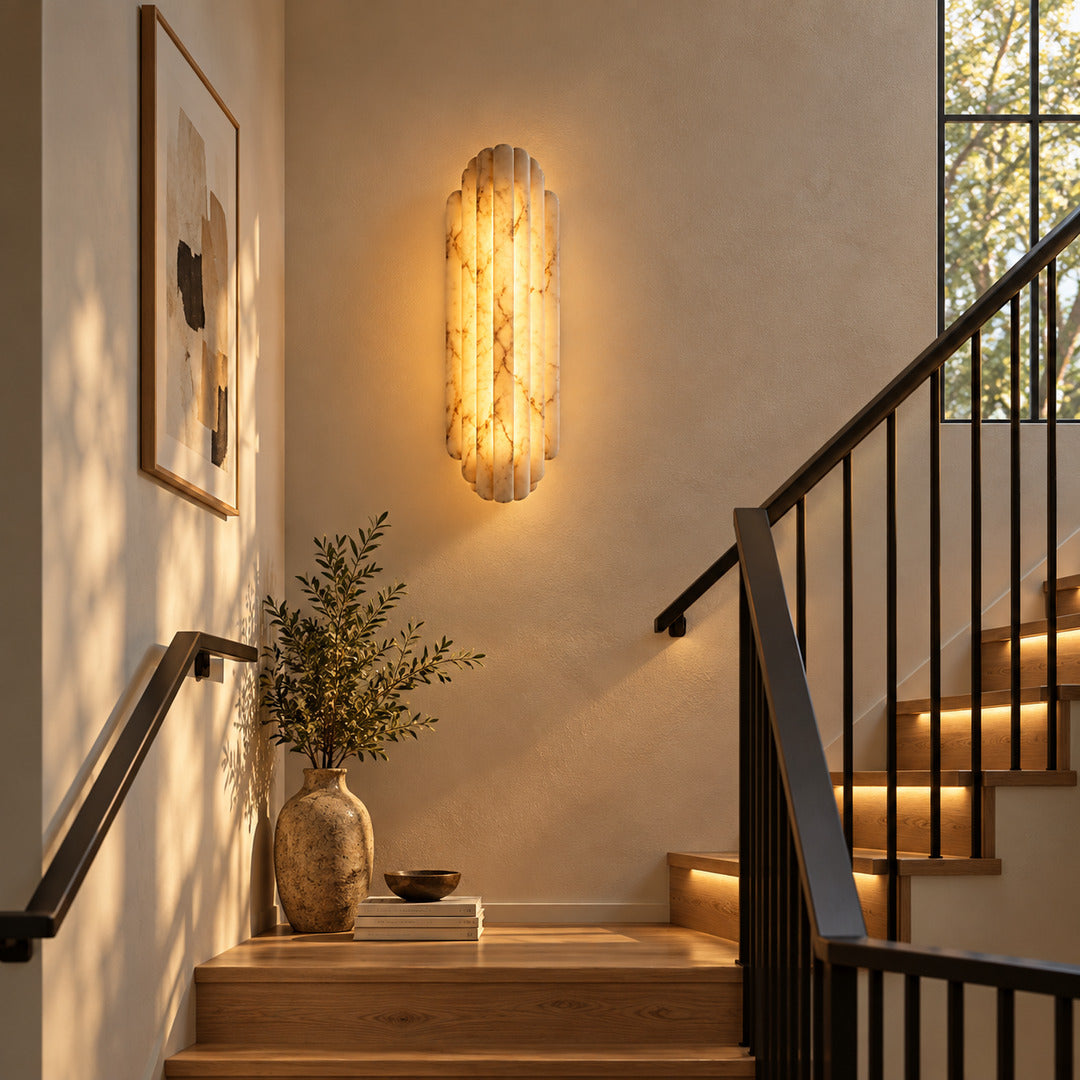 Lamina alabaster wall sconces along a staircase wall