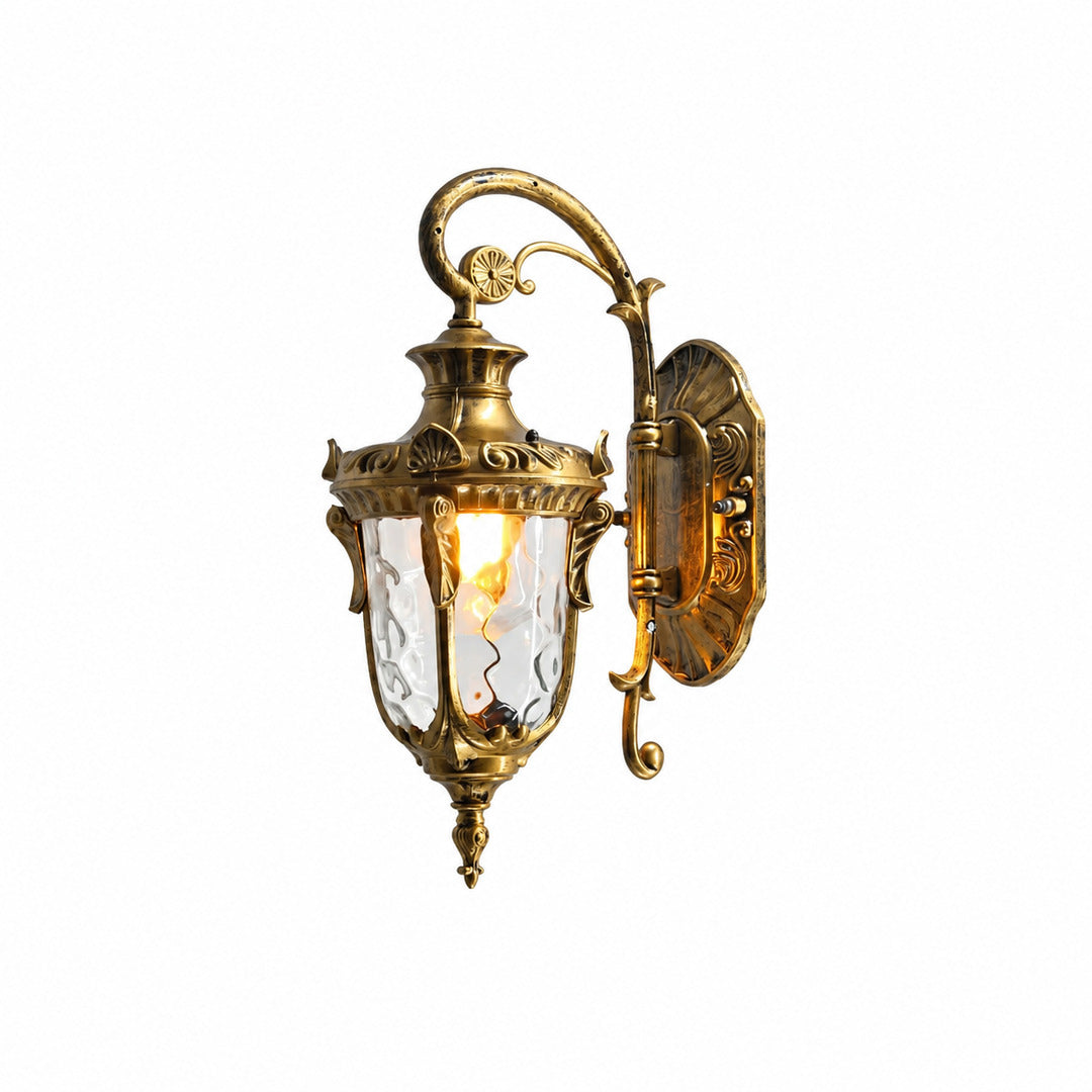 Lanterna outdoor wall sconce with a vintage lantern frame and glass shade glowing warm beside a front door