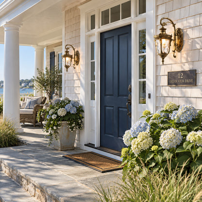 Lanterna outdoor wall sconce lighting a covered front porch with a warm vintage glow