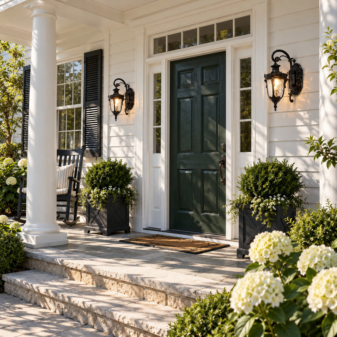 Lanterna outdoor wall sconce lighting a covered front porch with a warm vintage glow