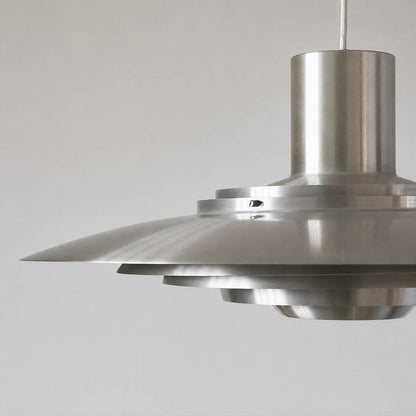 Larkin P376 disc side profile flat aluminum minimalist Mid Century geometric craftsmanship detail close up