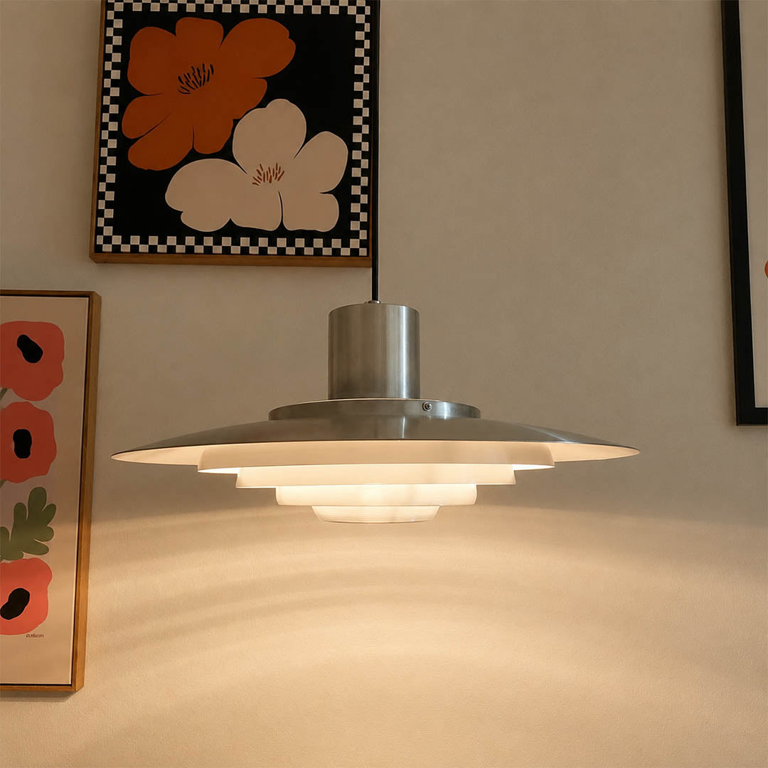 Larkin White P376 style aluminum disc pendant foyer entryway statement Modern Scandinavian designer warm glow welcoming interior lifestyle