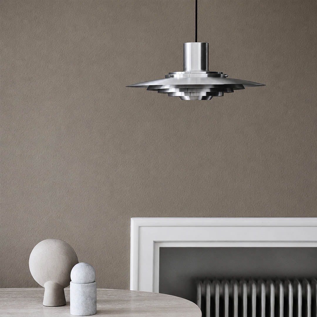 Larkin Silver P376 style aluminum disc pendant living room Mid Century Modern statement piece designer warm glow architectural lifestyle