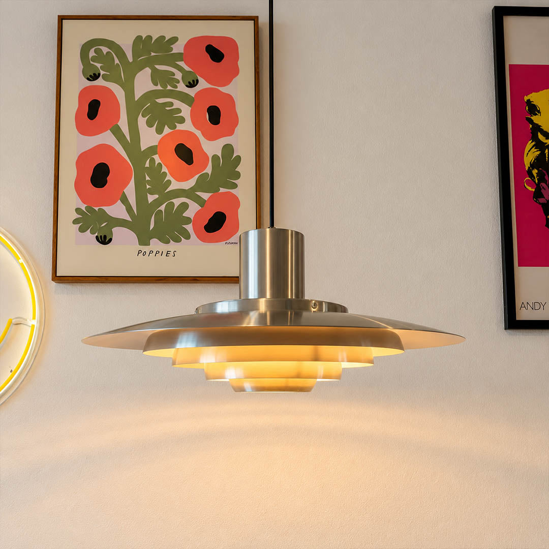 Larkin White P376 style aluminum disc pendant foyer entryway statement Modern Scandinavian designer warm glow welcoming interior lifestyle