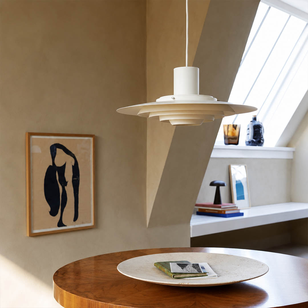Larkin White P376 style aluminum disc pendant dining room Modern Scandinavian minimalist designer warm glow interior lifestyle
