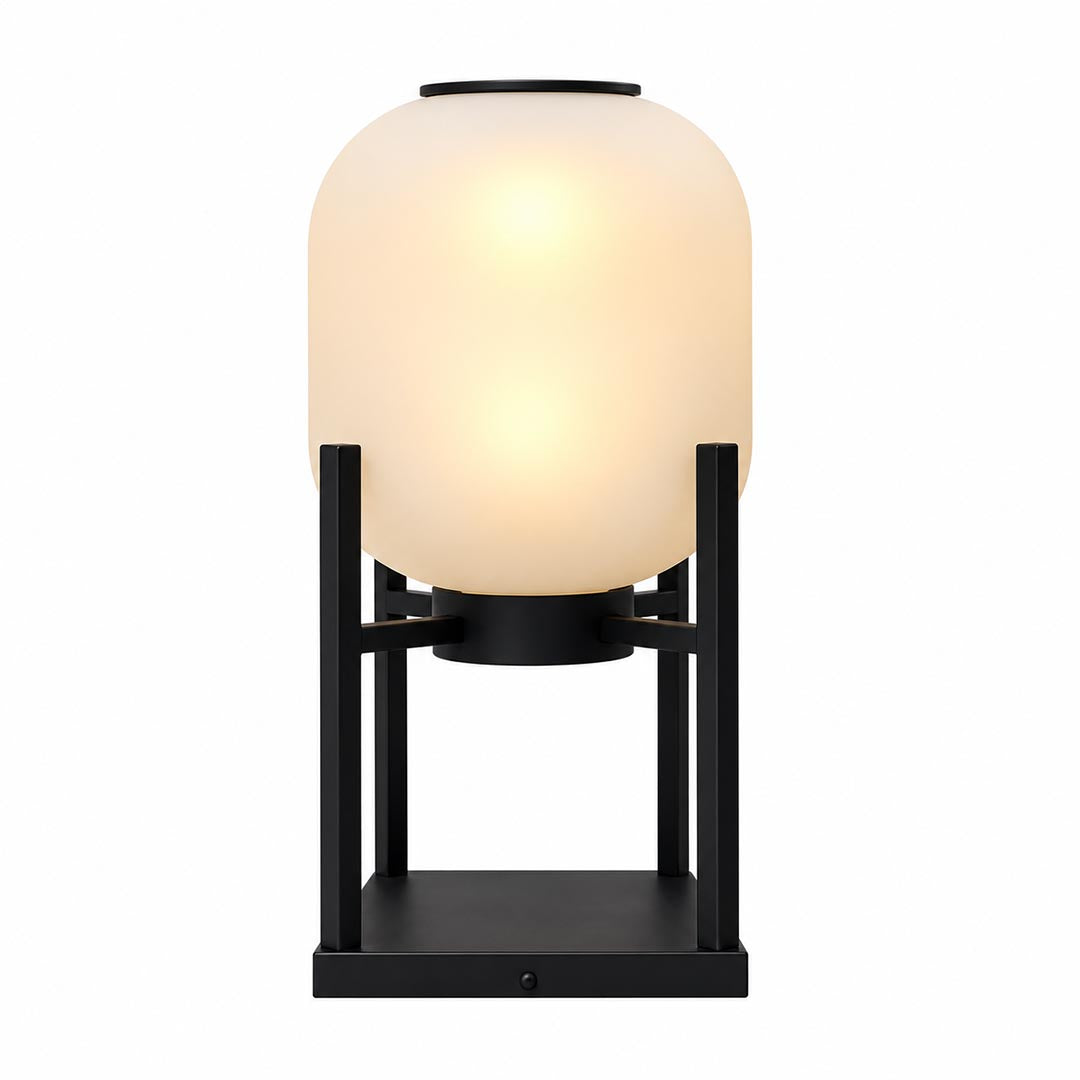 Larsen outdoor solar lantern floor lamp with a warm glowing shade on a black frame.