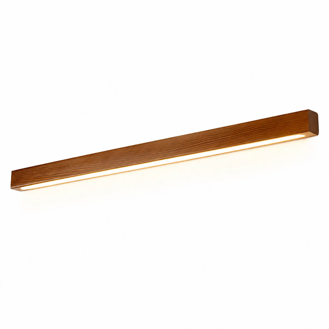 Larsson linear wood wall light walnut color wood integrated LED warm glow slim linear bar white background front view