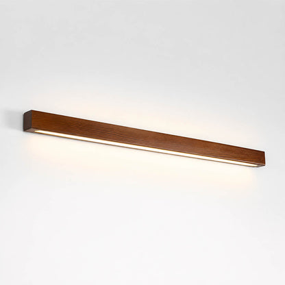 Larsson linear wood wall light walnut color wood integrated LED warm glow slim linear bar white background front view