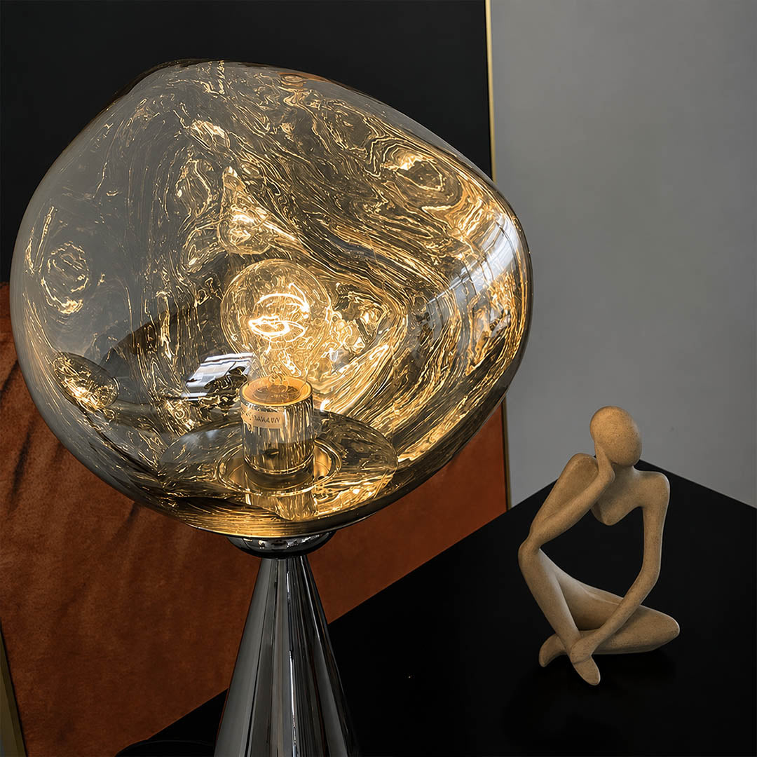 Lava sculptural floor lamp twisted distorted spherical molten metallic form sculptural unique design detail close up