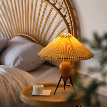 Legno table lamp modern primary bedroom bedside nightstand tripod burl wood pleated beige shade Mid Century Modern warm ambient intimate cozy sophisticated lifestyle interior American home